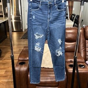 American Eagle 10R high waist torn leg skinny jeggings.